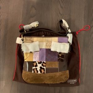 Authentic multicolored Coach purse. Never used.